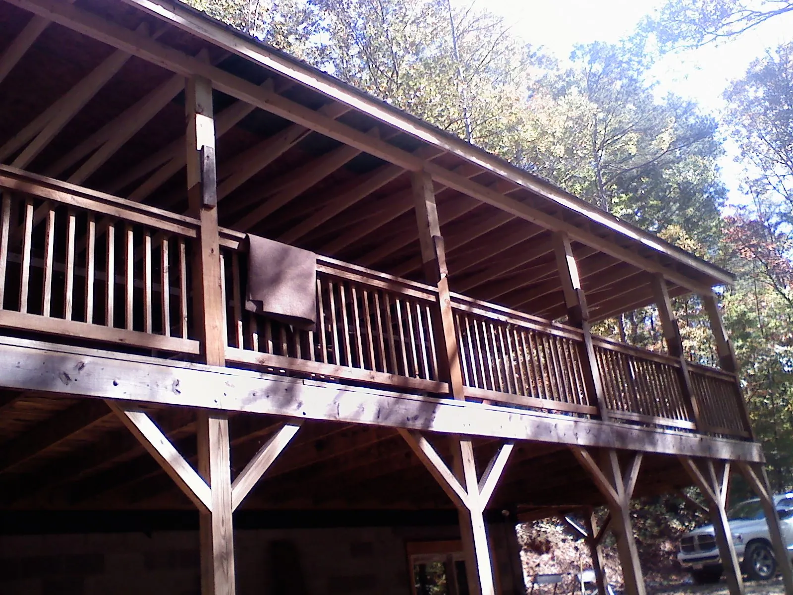 Timber framing under a new elevated porch and deck — Roof Leak Repair in New Columbia by Roofing Brothers